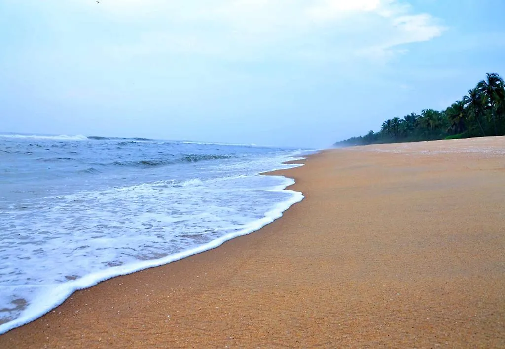 Апартаменты Kavvayi Beach House Payyannur Проживание в семье